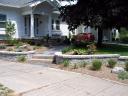 New Slate Sidewalk With Limestone Steps, New Belgard Wall and New Landscape